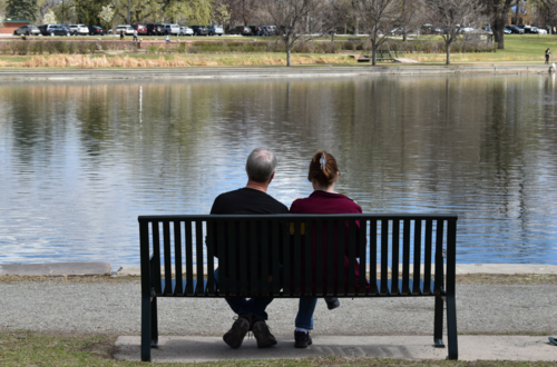 couple seated on bench